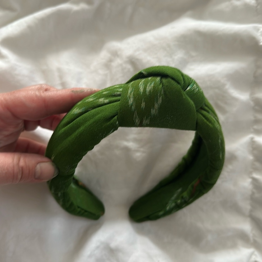 Fairtrade headband in vibrant green.
